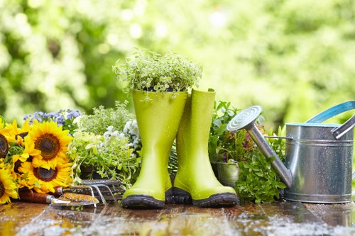 Worker performing first aid and emergency response during a gardening task